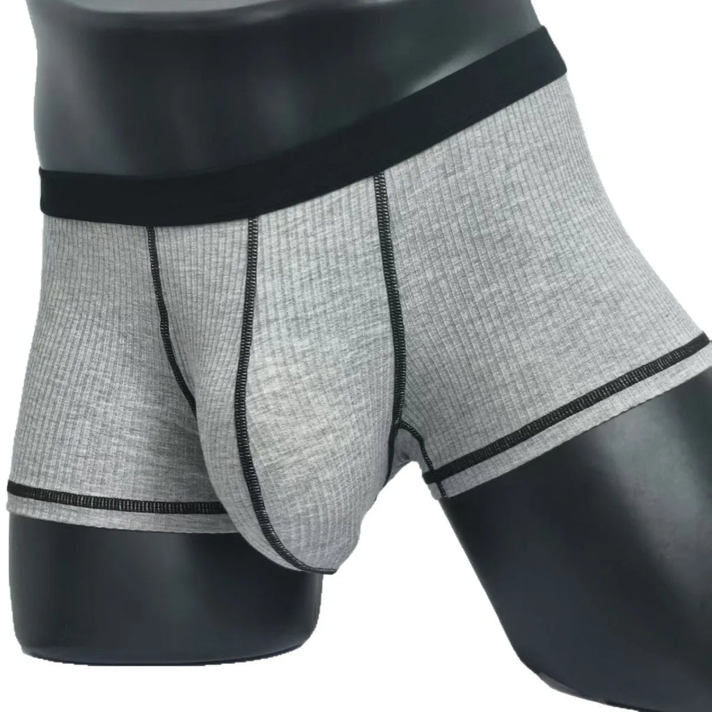 Men's breathable boxers in Army Green solid colour showing thin fabric construction and body shaping design