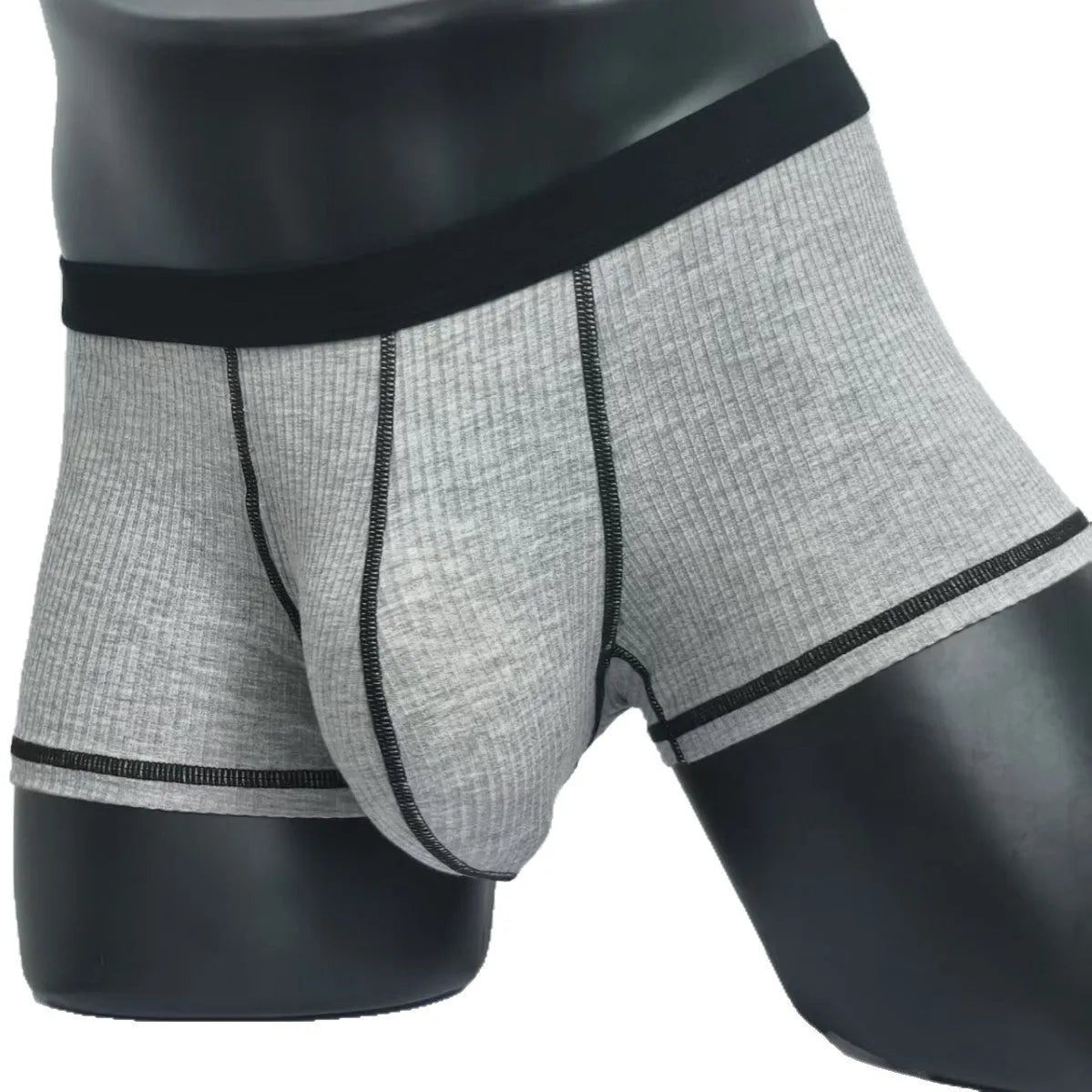 Men's breathable boxers in Army Green solid colour showing thin fabric construction and body shaping design