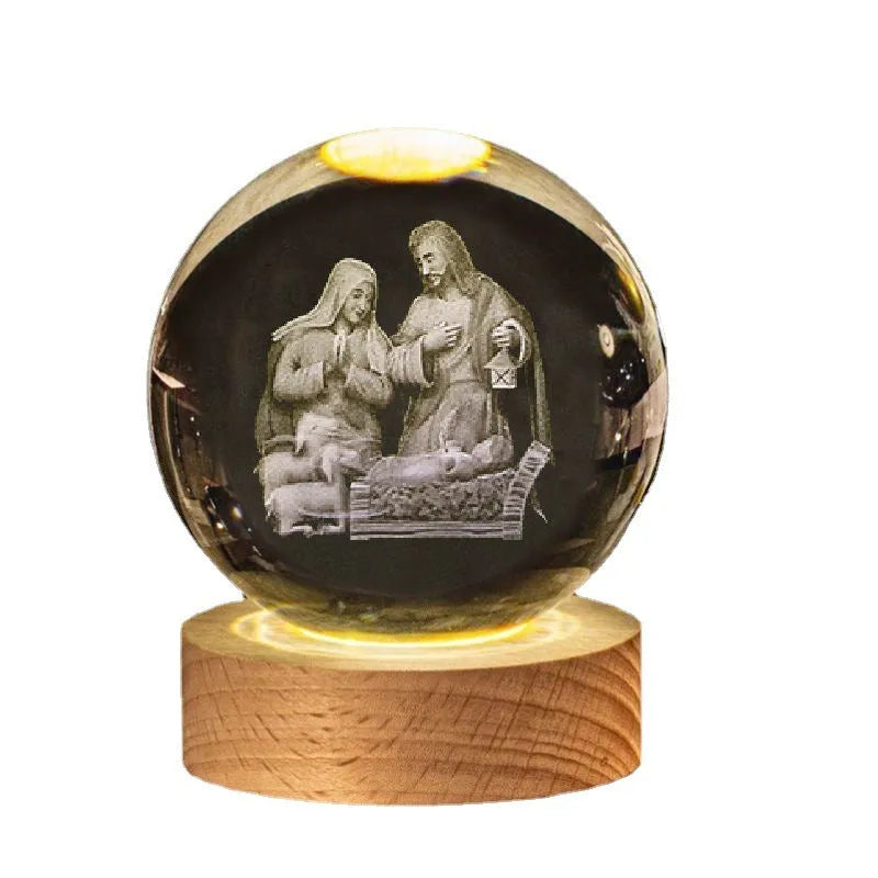 White crystal ball ornament with wood base and warm light, showing detailed internal design.