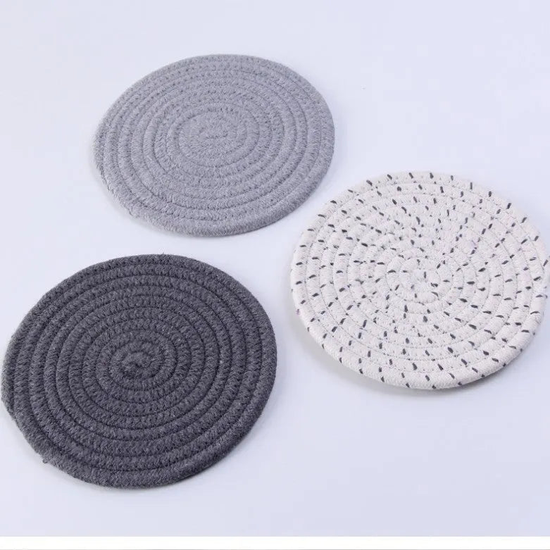 Three round cotton cord coasters in modern simplicity design with 18cm diameter