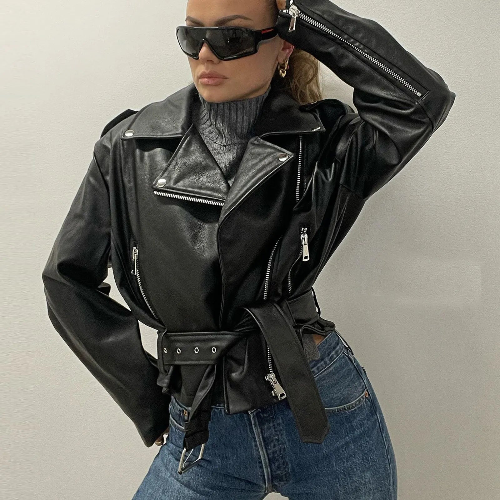 Black punk locomotive style jacket with short belt lapel and Peter Pan collar