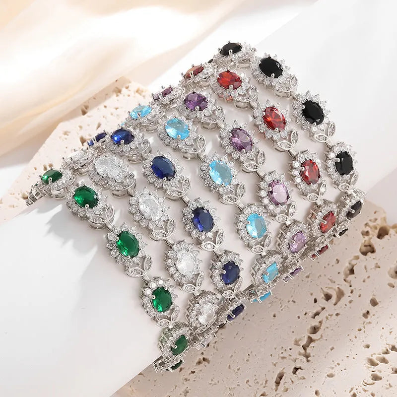 Women's bracelet with inlaid zircon gemstones in multiple colours on environmentally friendly alloy band