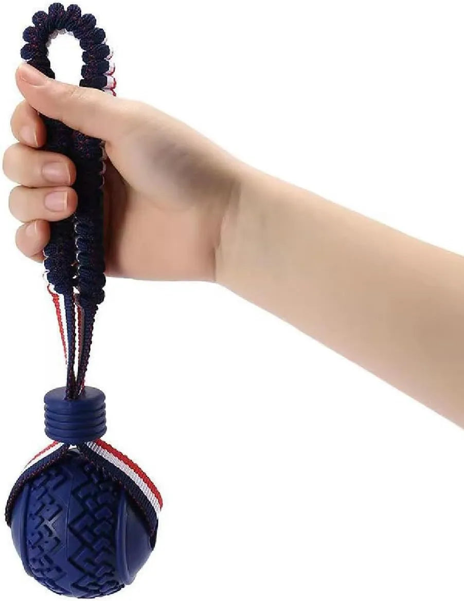 Natural rubber dog ball with rope toy in blue or red featuring textured surface for teeth cleaning