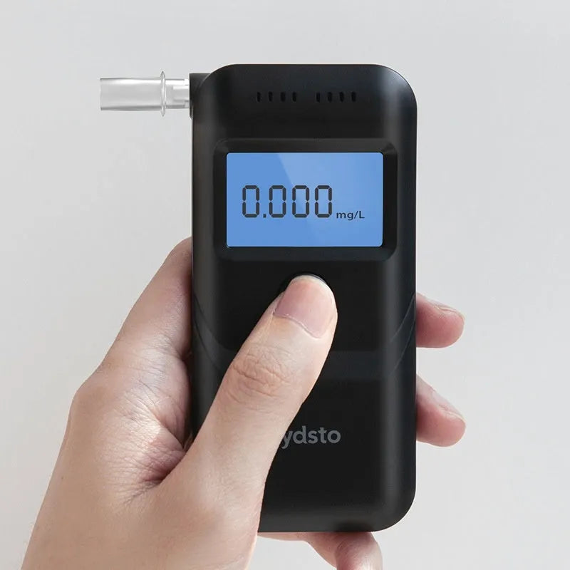 Black household alcohol breath tester device with height detector function