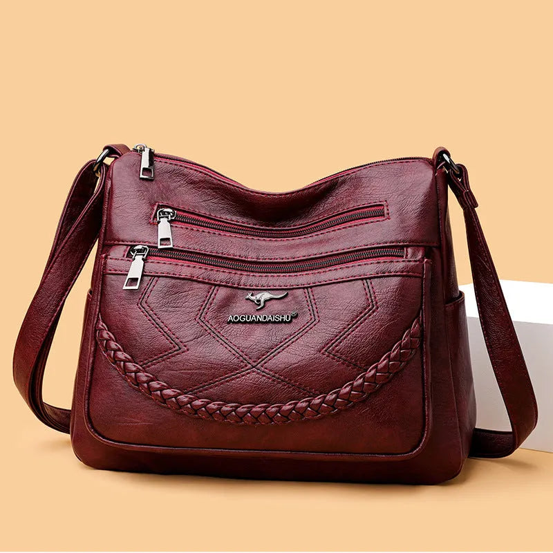 Soft PU leather crossbody shoulder bag in horizontal square shape with crossbody strap