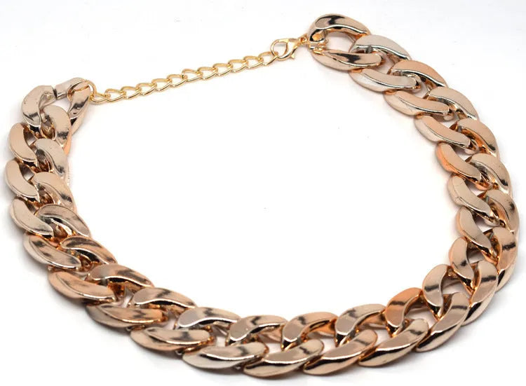 Geometric chain dog collar with gold finish and adjustable buckle for small to medium-sized dogs