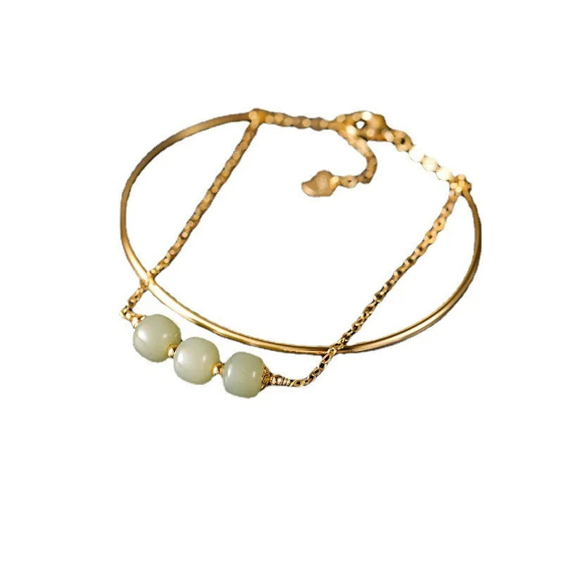 Jade lucky bead bracelet for women with gold inlay treatment in single, double and three beads versions