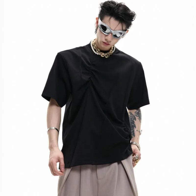 Men's grey cotton T-shirt with loose fit, round neck, short sleeves, and textured three-dimensional pleats.