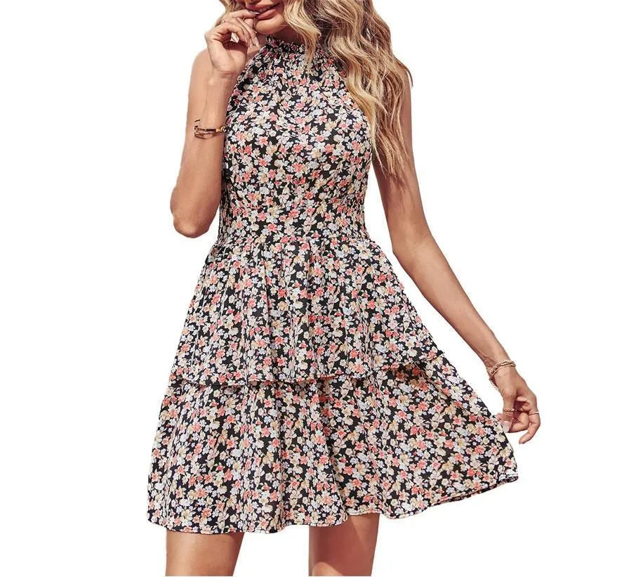 Women's backless halter dress with ruffled A-line skirt in a boho print
