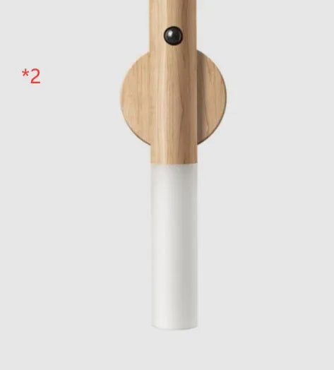 Compact smart sensor LED desk lamp made of solid wood and organic glass in coffee colour.