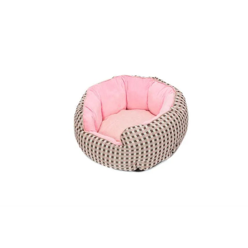 Blue octagonal pet sofa bed with a removable central mat for a small dog or cat.