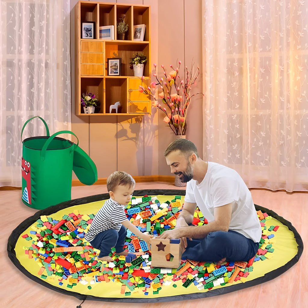 Green felt cube storage bag with a pull rope, laid flat as a play mat.