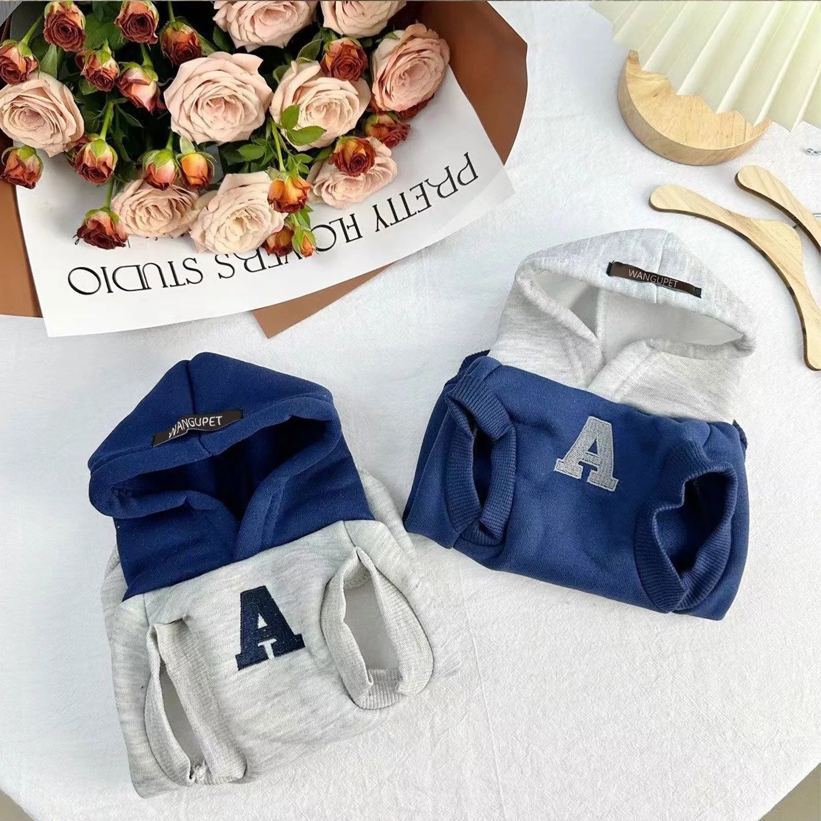 Blue and grey-white reflective letter pet hoodie for cats and dogs on mannequin
