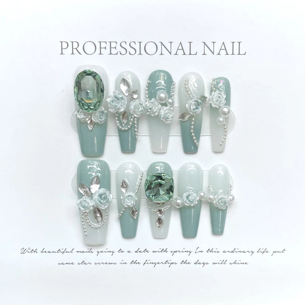 Plastic nail art armour suit with camellia gradient chain design and bow butterfly patterns