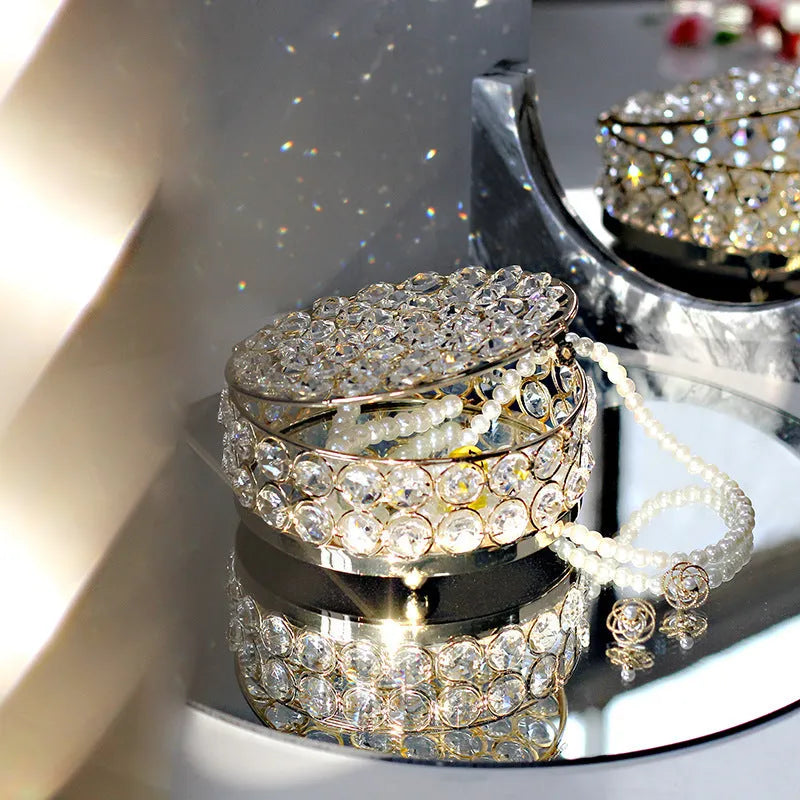 French gold European style jewellery storage box with transparent crystal glass sides and lid.