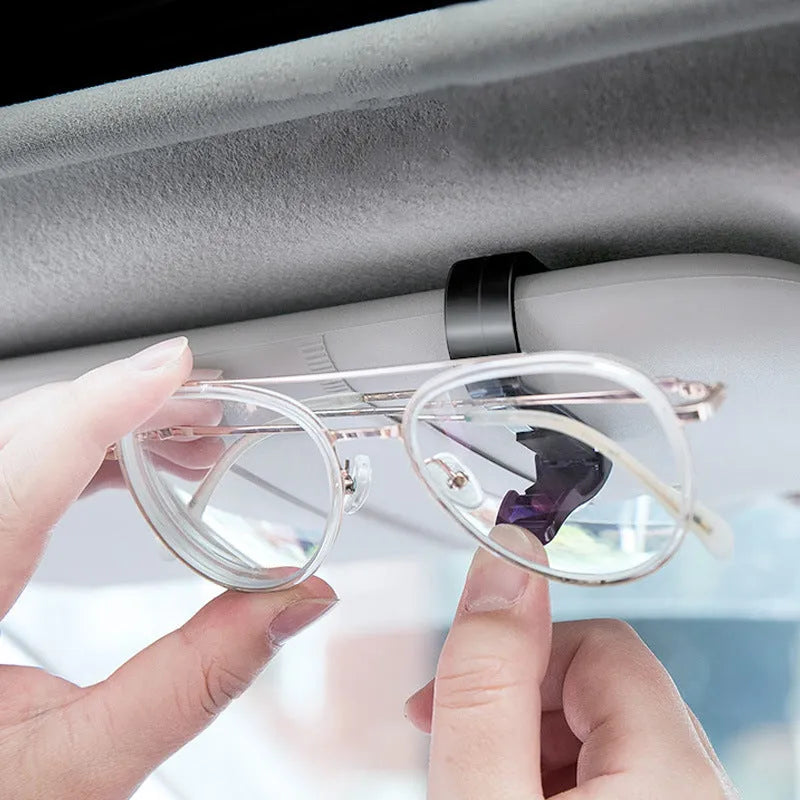 Black plastic car sunshade clip for holding glasses, tickets and ID cards