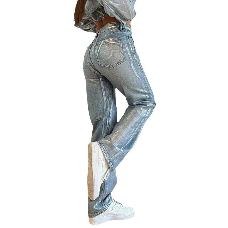High waist straight leg blue jeans with hot silver contrast details on a model, showing the street hipster style.