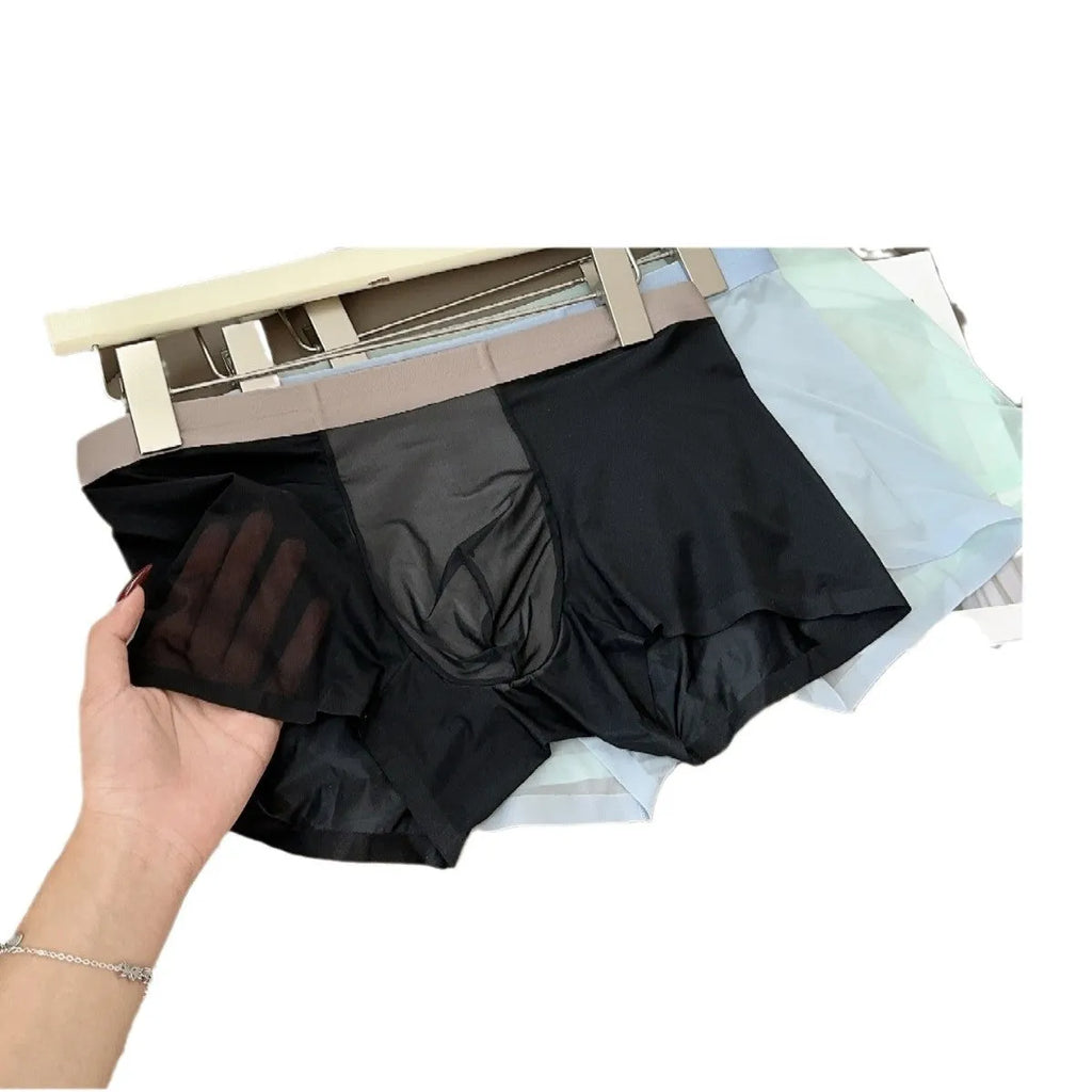 Men's seamless antibacterial boxer shorts in ice silk fabric showing honeycomb crotch detail.