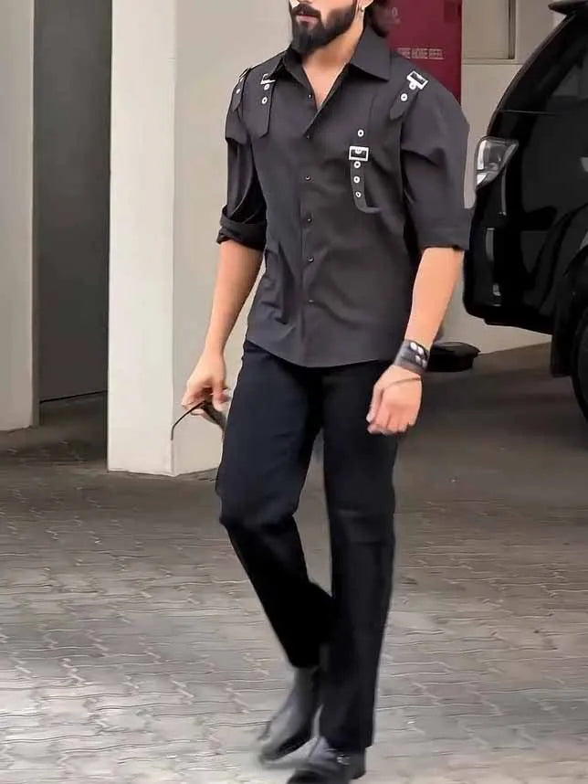 A man's black utility-style button-up shirt with a regular fit, laid flat.