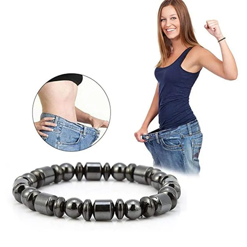 Black stretch bracelet with a pentagram design made from magnetite and hematite stones.