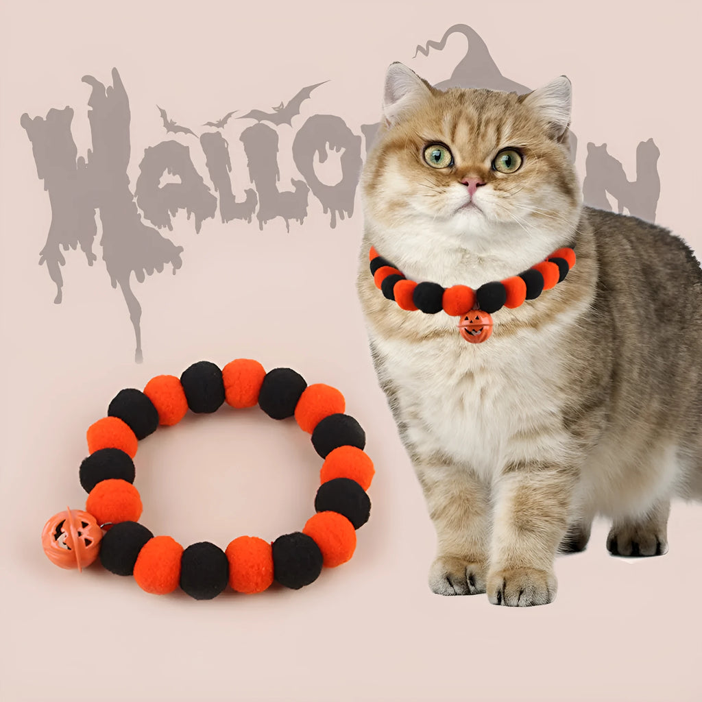 Orange and black Halloween pumpkin pet collar with jingle bell and buckle fastener for cats and dogs