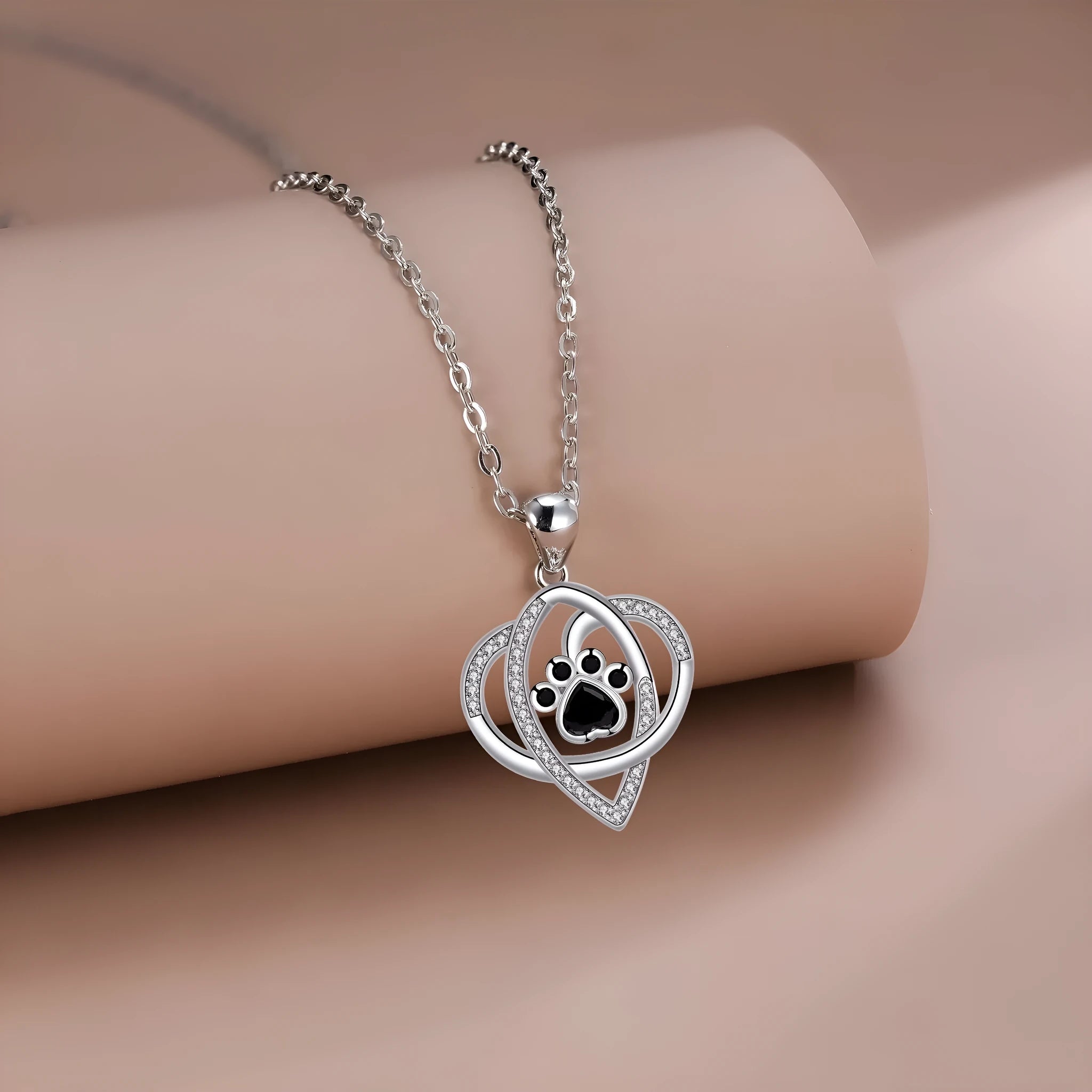 Copper pendant necklace with dog and cat paw prints on cross chain for women