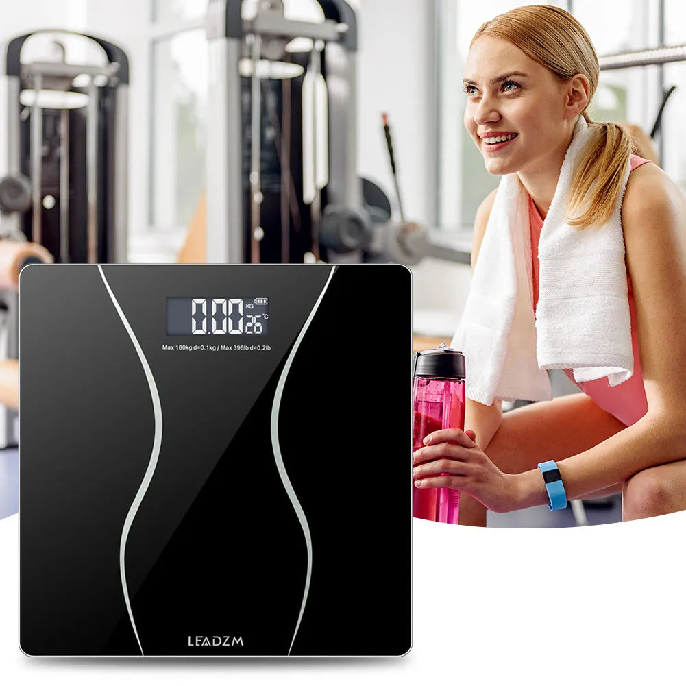 Black electronic household bathroom scale with digital display and 180kg maximum capacity