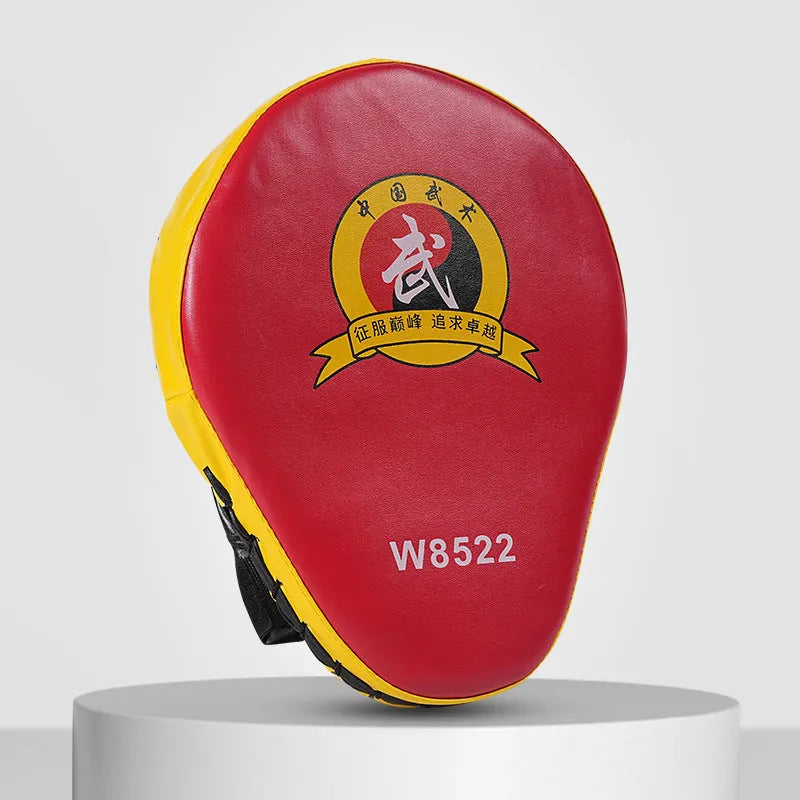 A pair of PU punch mitts for boxing and Muay Thai training, shown in a red edge and black surface colour variant.