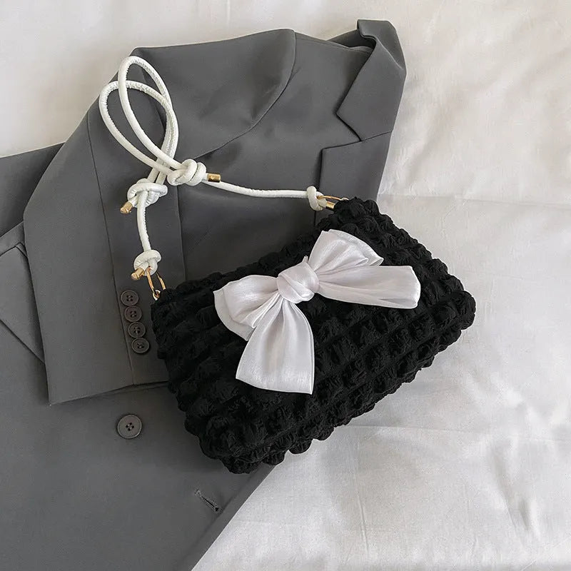 Women's one-shoulder canvas handbag in horizontal square shape with single strap