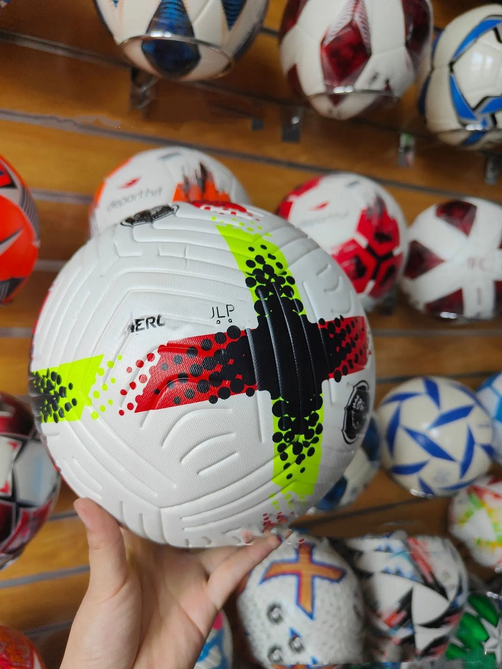 Fluorescent green Size 5 football with PU leather construction for training and matches