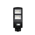 Integrated solar street light unit with solar panel and LED light in one housing