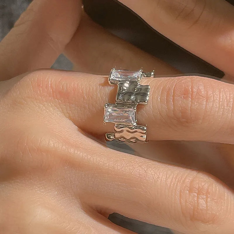 Silver cross zircon ring with open gemstone design and geometric three-dimensional decoration in retro style