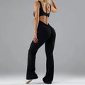 Women's black seamless hollow-out yoga bodysuit with built-in bra pads, showing mid-waist and full-length fit.