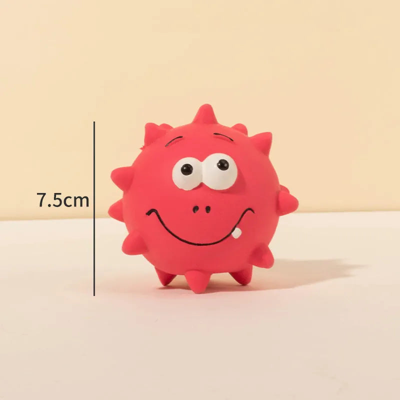 Four coloured natural latex squeaky dog balls with cute faces, each measuring 7.5cm