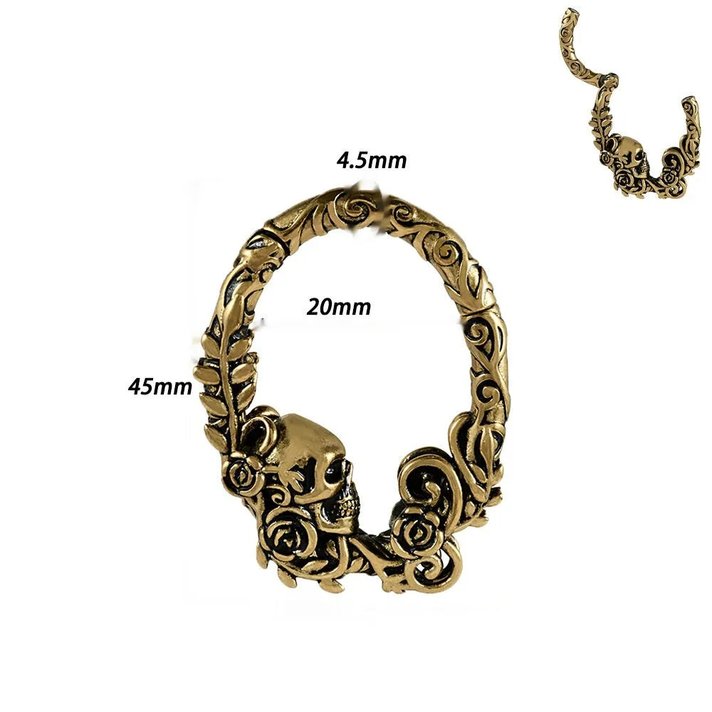 A pair of copper geometric magnetic ear extenders with a 15mm conical round magnet in one of eight style variations.