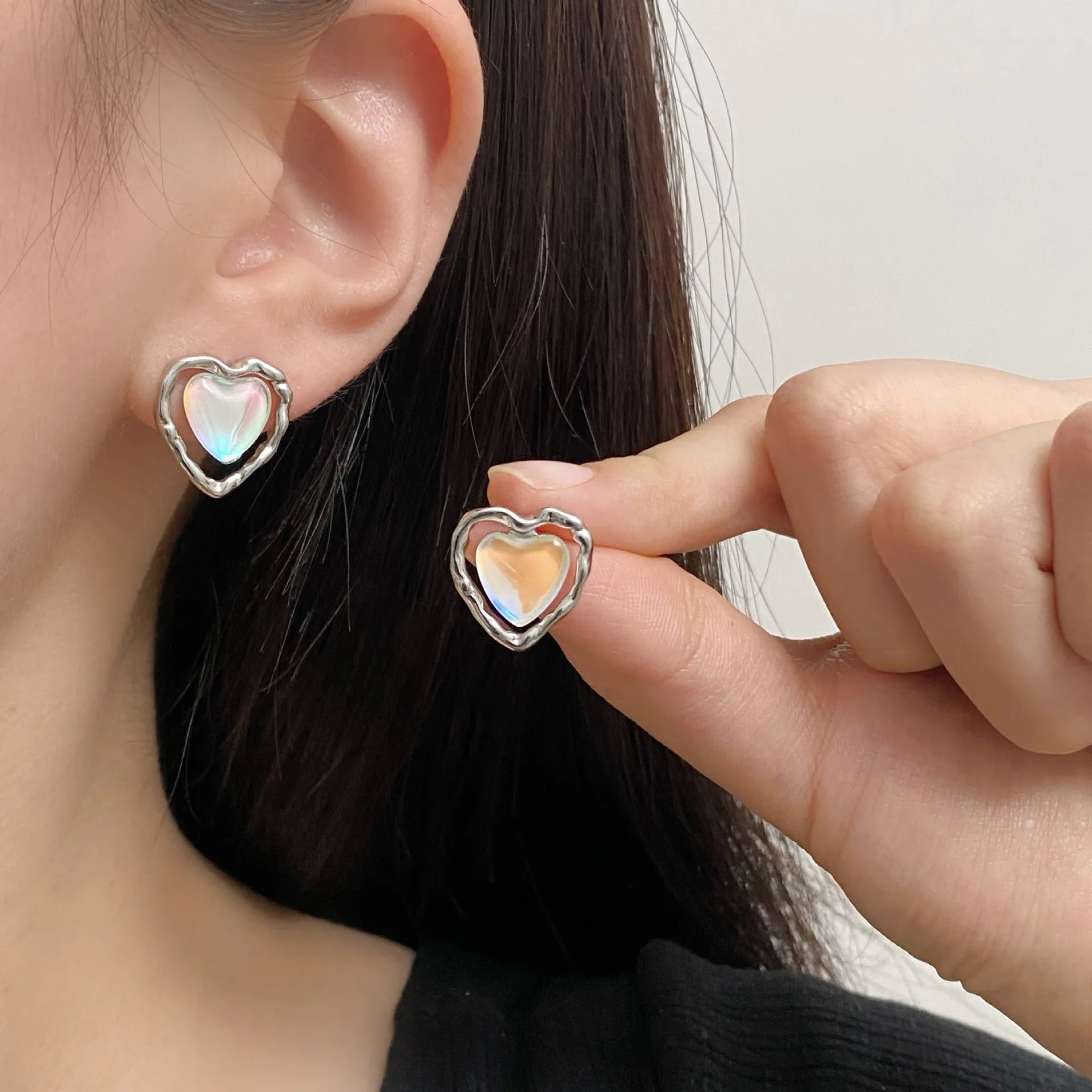 Women's alloy geometric heart earrings in ear clip and ear stud styles with electroplated finish