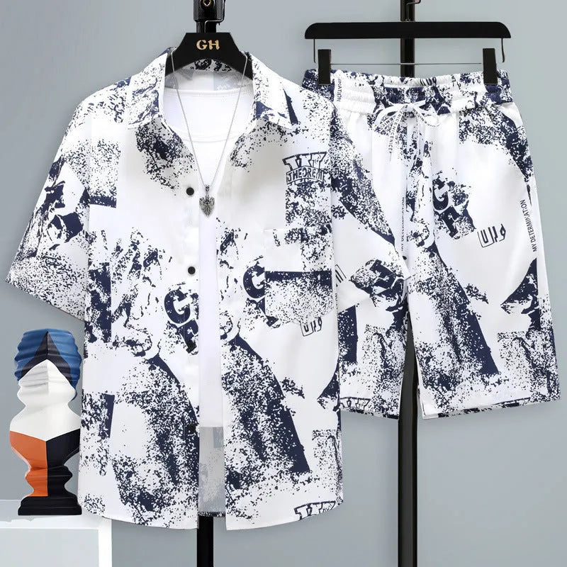 Men's grey casual polyester short-sleeve top and shorts two-piece set laid flat.