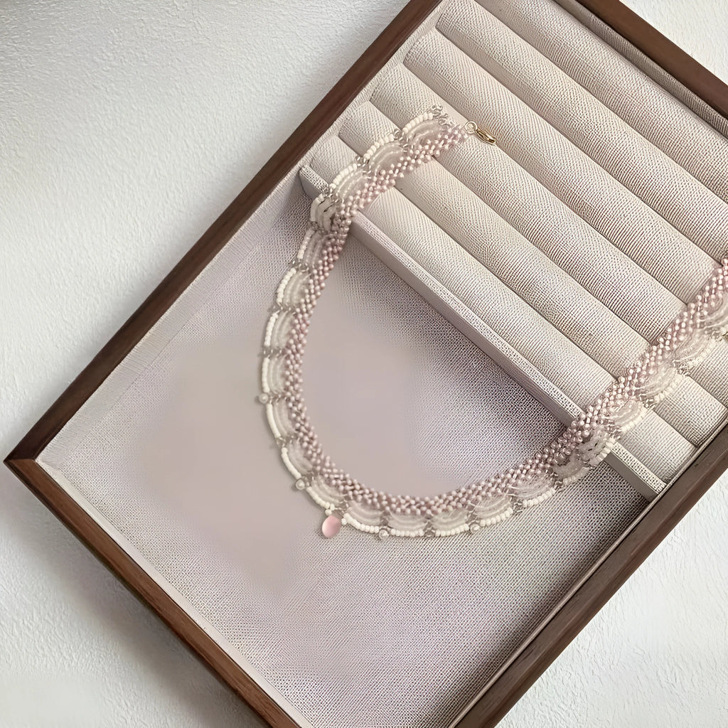 Hand-woven pink glass bead tassel necklace with alloy pendant on regular chain