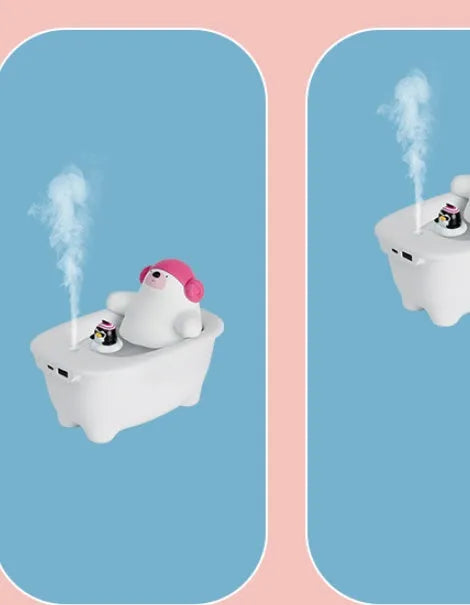 White Creative Air Humidifier with USB cable on a desk, showing its compact size and large water tank.