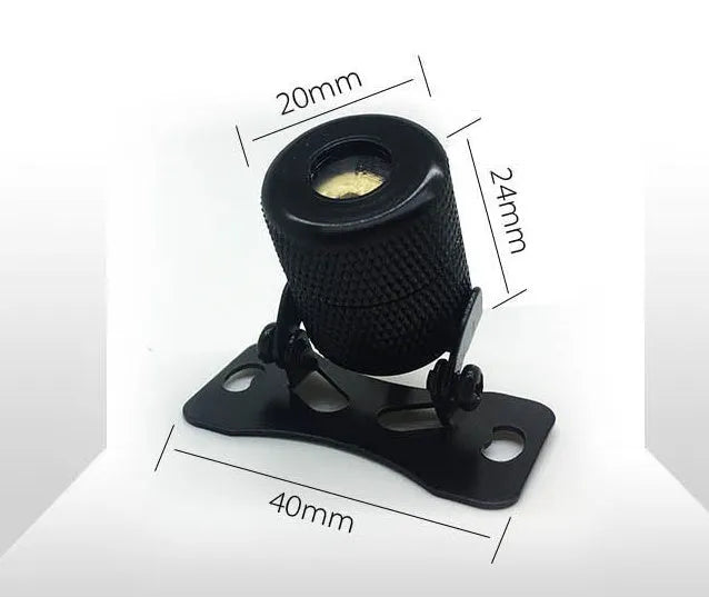 Universal vehicle laser fog lamp in aluminium housing with red laser, shown with screws and mounting tape.
