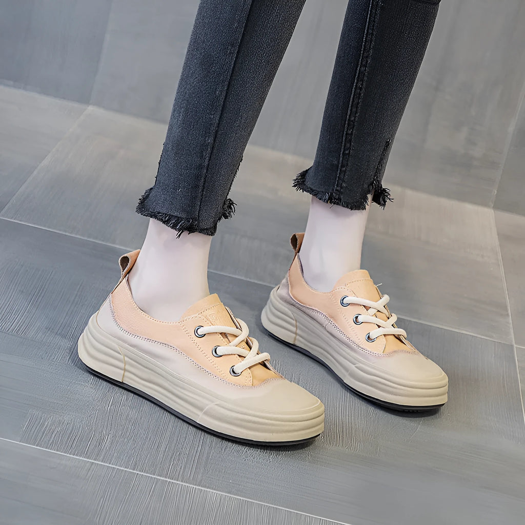 Women's leather low-top platform sneakers in matcha green on a white background.