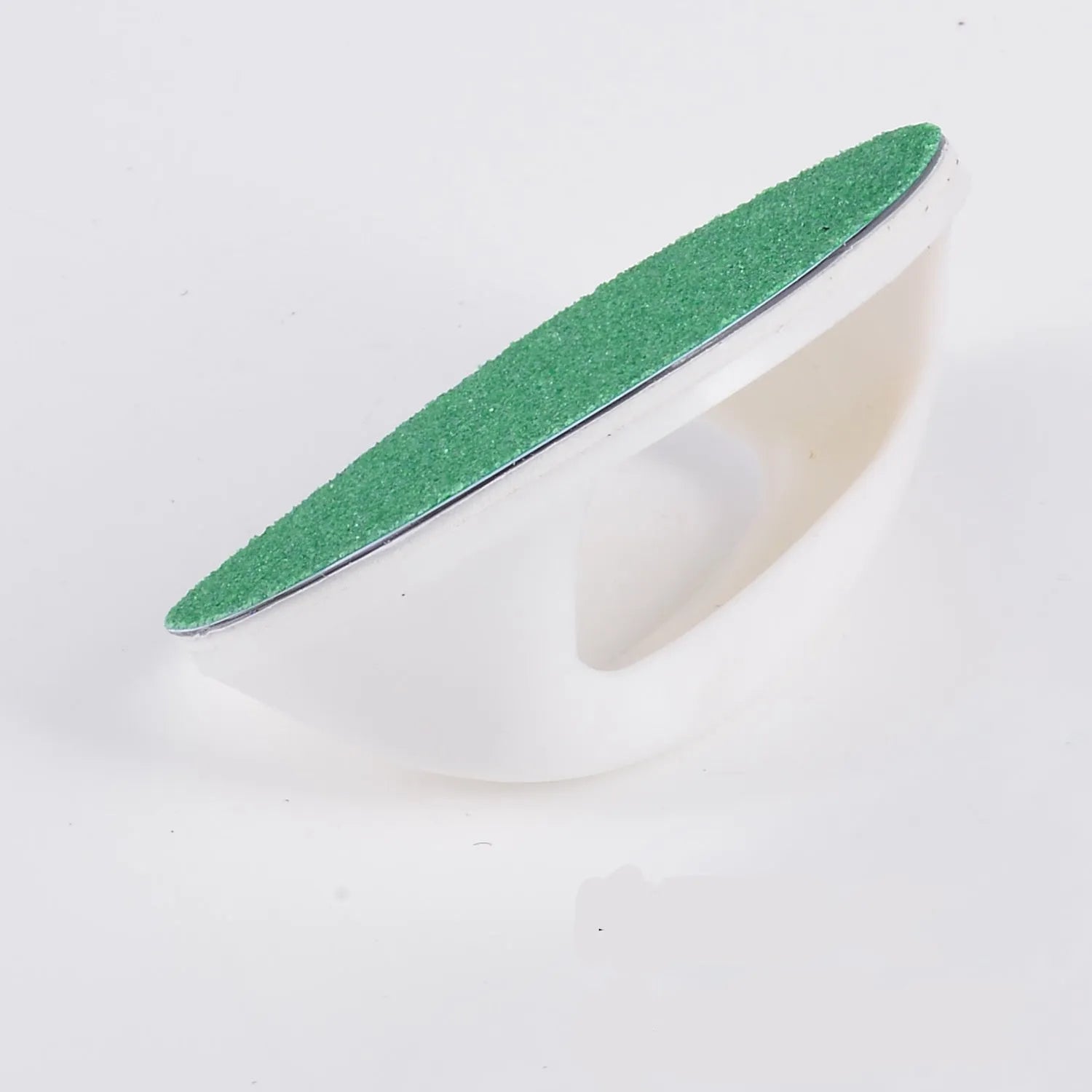 Round dog nail scratch board with ergonomic handle in one of four colours.