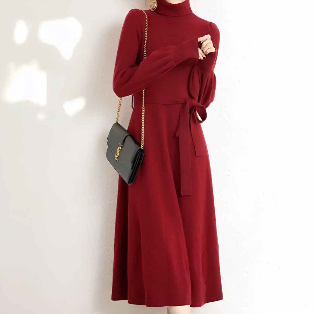 Women's turtleneck long sleeve knit dress in loose fit with big hem and elastic waist.