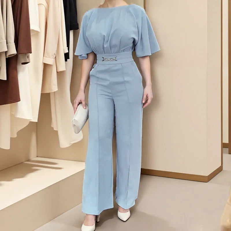 Blue men's casual polyester suit set with trousers and a long-sleeved shirt on a mannequin