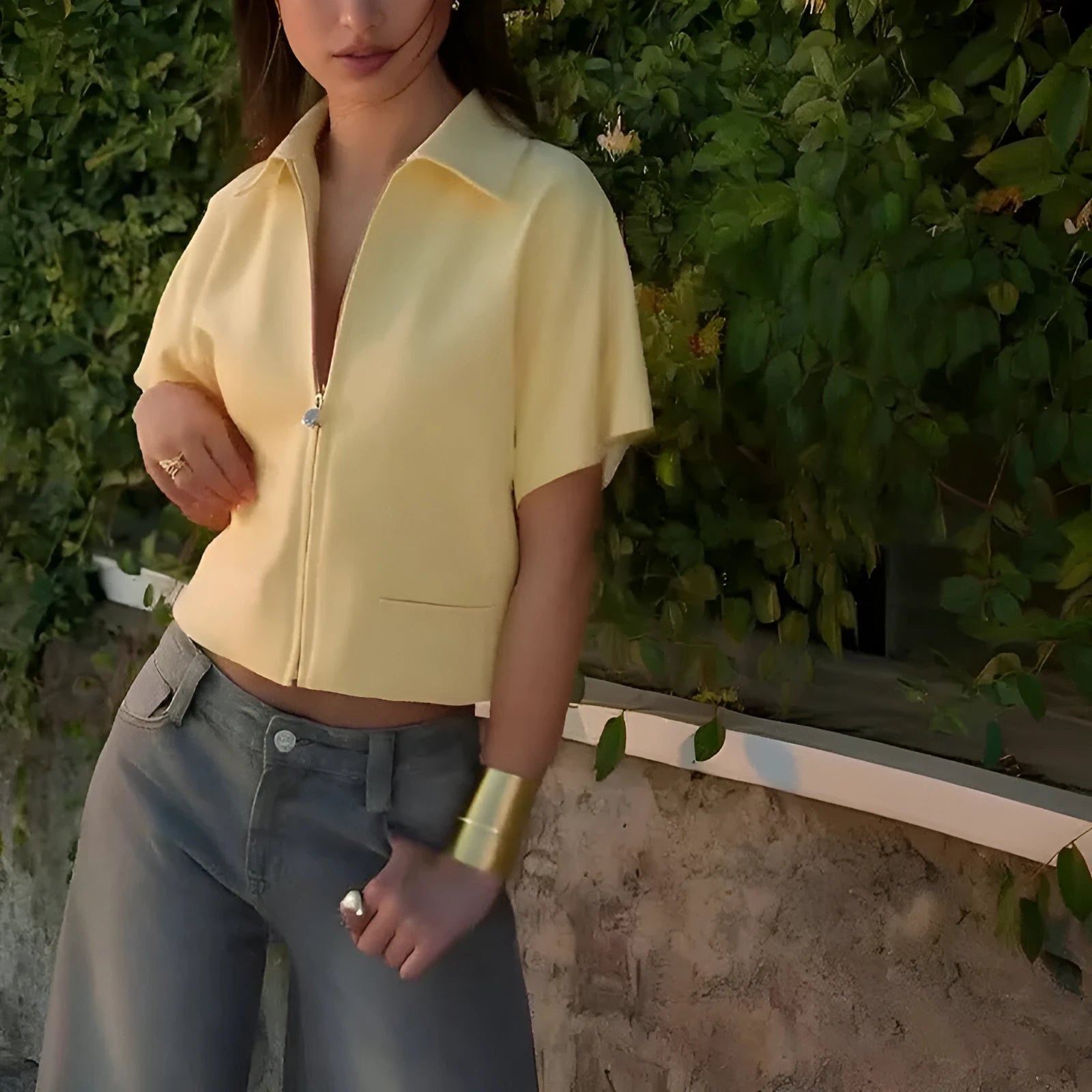 Loose fit casual polyester top in black, white or yellow with short sleeves