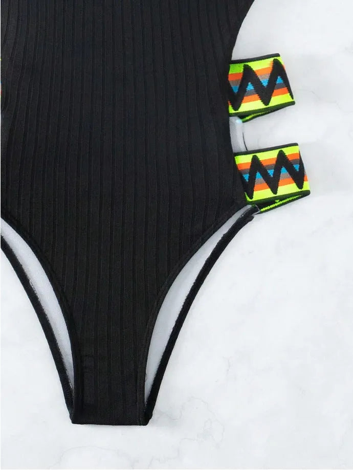 Women's solid colour one-piece polyester swimsuit shown in black and orange options