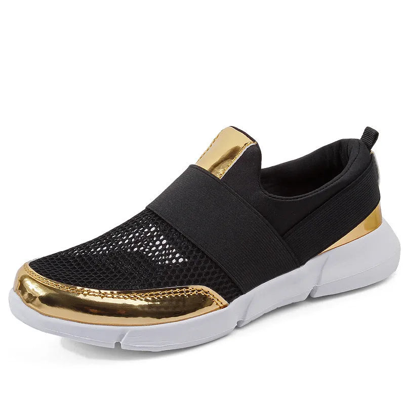 Blue, black, and grey women's low-cut mesh sneakers with a PU midsole on a hard floor.