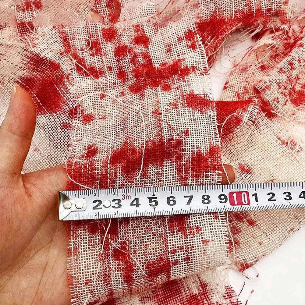 Red and white dyed bloody gauze bandage roll for Halloween costume horror prop decoration