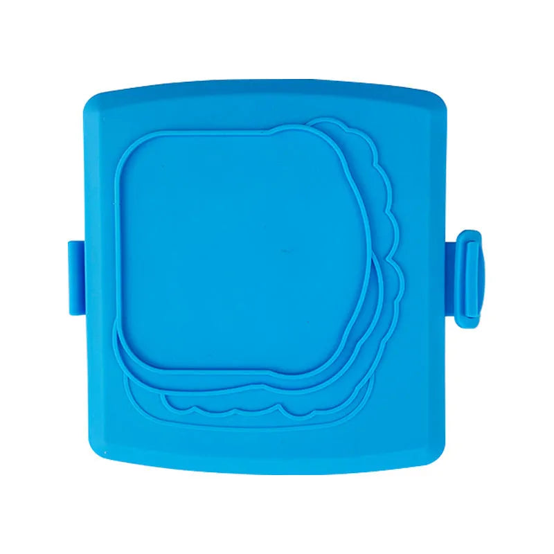 Red silicone baking tray and matching anti-scald gloves set on a kitchen counter.