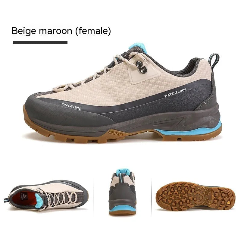 Men's low-top mountain climbing shoes in black with non-slip rubber outsole and lace-up design